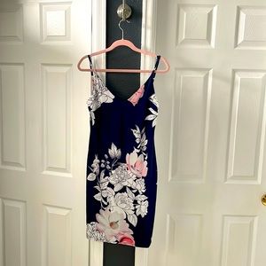 Beautiful navy blue floral dress. Never worn.
